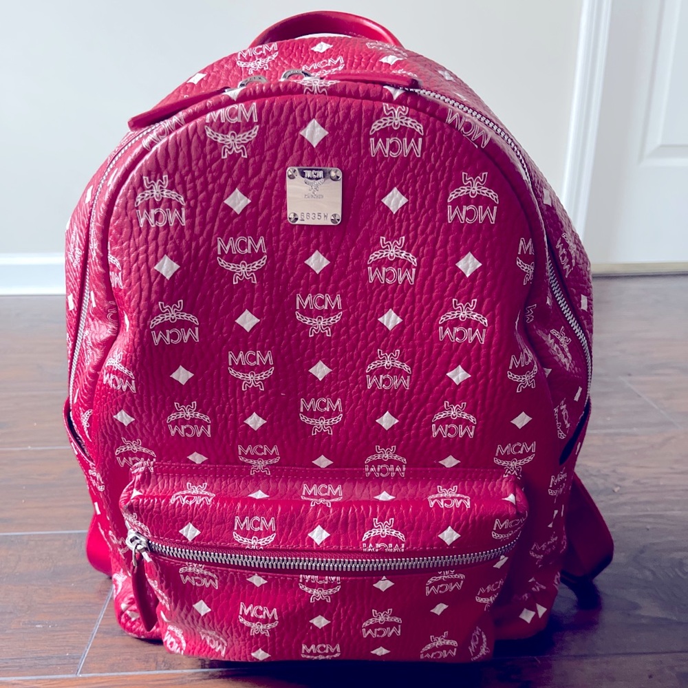 MCM red medium sized backpack. Very gently used!!